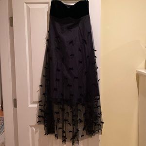 Special occasion. Black strapless asymmetrical dress